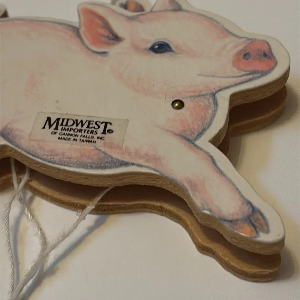 Flying Pig ornament Midwest Importers Canon Falls Wooden Pull String Toy